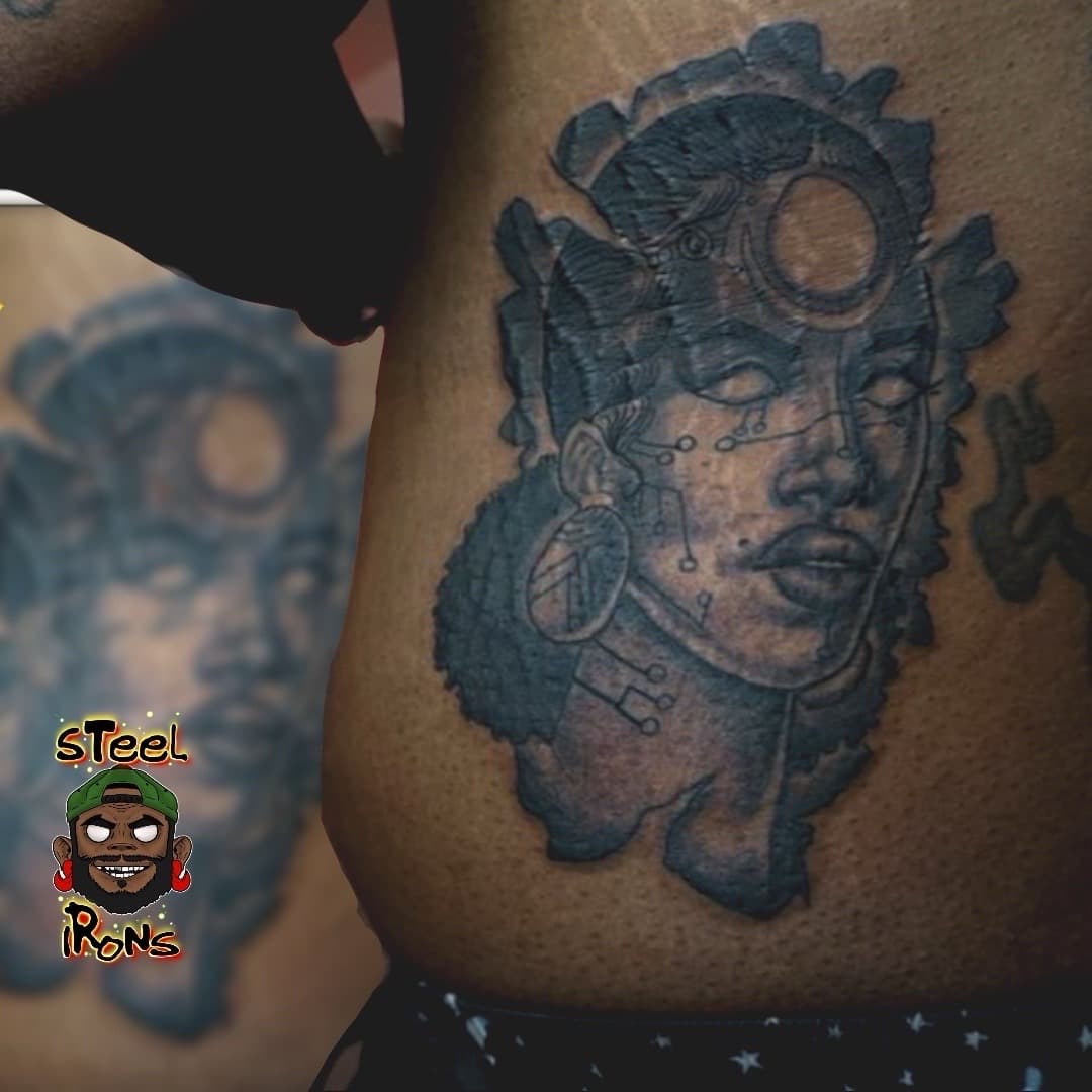 Black & Grey + Illustrative female face tattoo on Ribs by Steelirons on TattMe