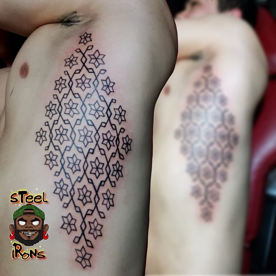 Geometric + Black-work geometric pattern tattoo on Ribs by Steelirons on TattMe