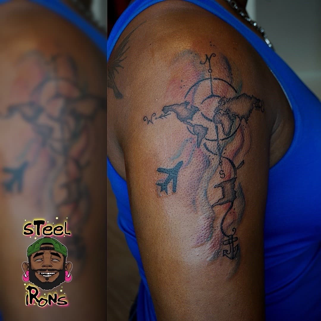 Line-work + Watercolor world map tattoo on Upper Arm by Steelirons on TattMe