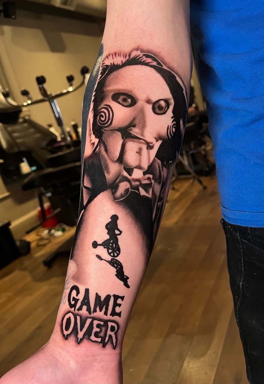 Black & Grey + Realism billy the puppet tattoo on Forearm by Noticeink on TattMe