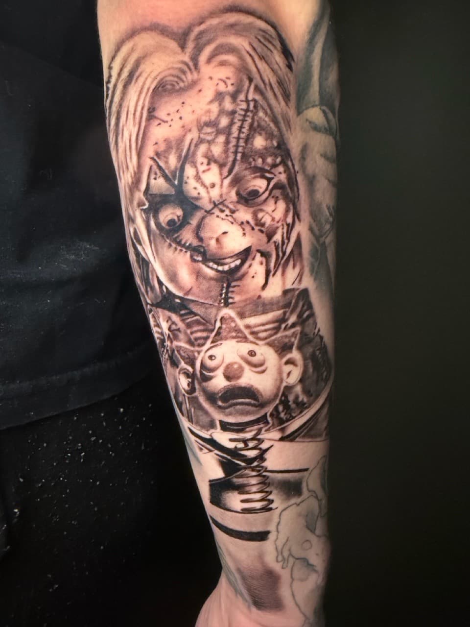 Black & Grey + Realism chucky tattoo on Forearm by Noticeink on TattMe