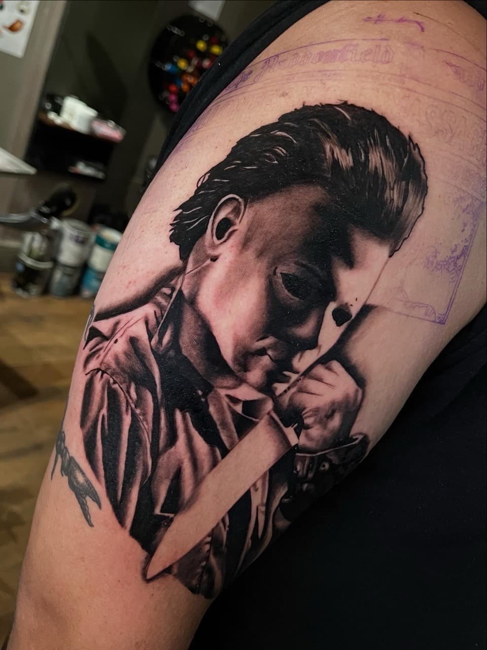 Black & Grey + Realism michael myers tattoo on Upper Arm by Noticeink on TattMe