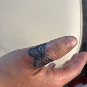 Fine Line + Black-work butterfly tattoo on Hand by Skull_Brothers_Ink on TattMe