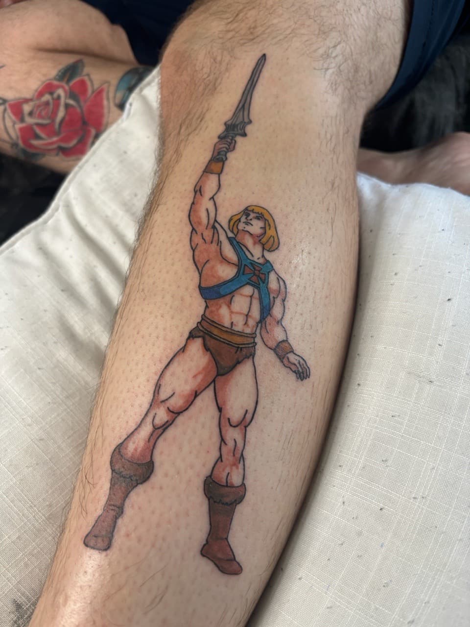 New School + Cartoon he-man tattoo on Calf by Skull_Brothers_Ink on TattMe