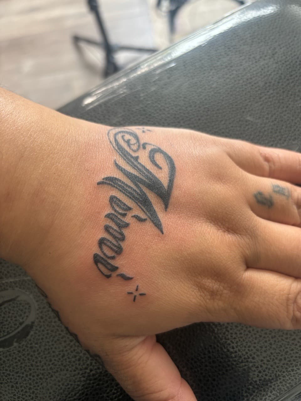 Lettering + Script name tattoo on Hand by Skull_Brothers_Ink on TattMe