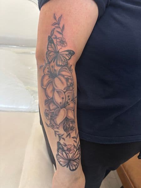 Black & Grey + Floral butterflies tattoo on Forearm by Skull_Brothers_Ink on TattMe