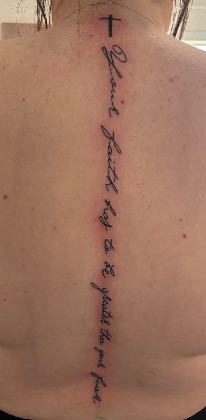 Lettering + Script cross tattoo on Spine by Skull_Brothers_Ink on TattMe