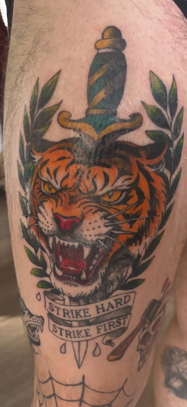 Traditional + American Traditional tiger tattoo on Thigh by Skull_Brothers_Ink on TattMe