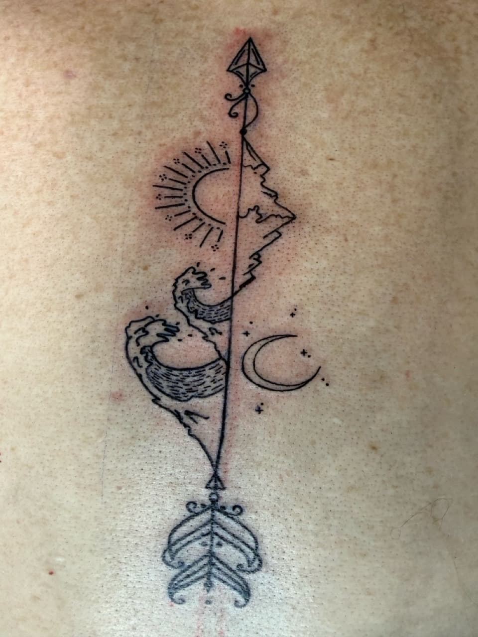 Fine Line + Geometric arrow tattoo on Upper Back by Skull_Brothers_Ink on TattMe