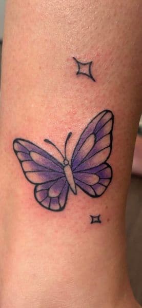 Color + Illustrative butterfly tattoo on Calf by Skull_Brothers_Ink on TattMe