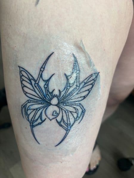 Fine Line + Black-work spider tattoo on Thigh by Skull_Brothers_Ink on TattMe