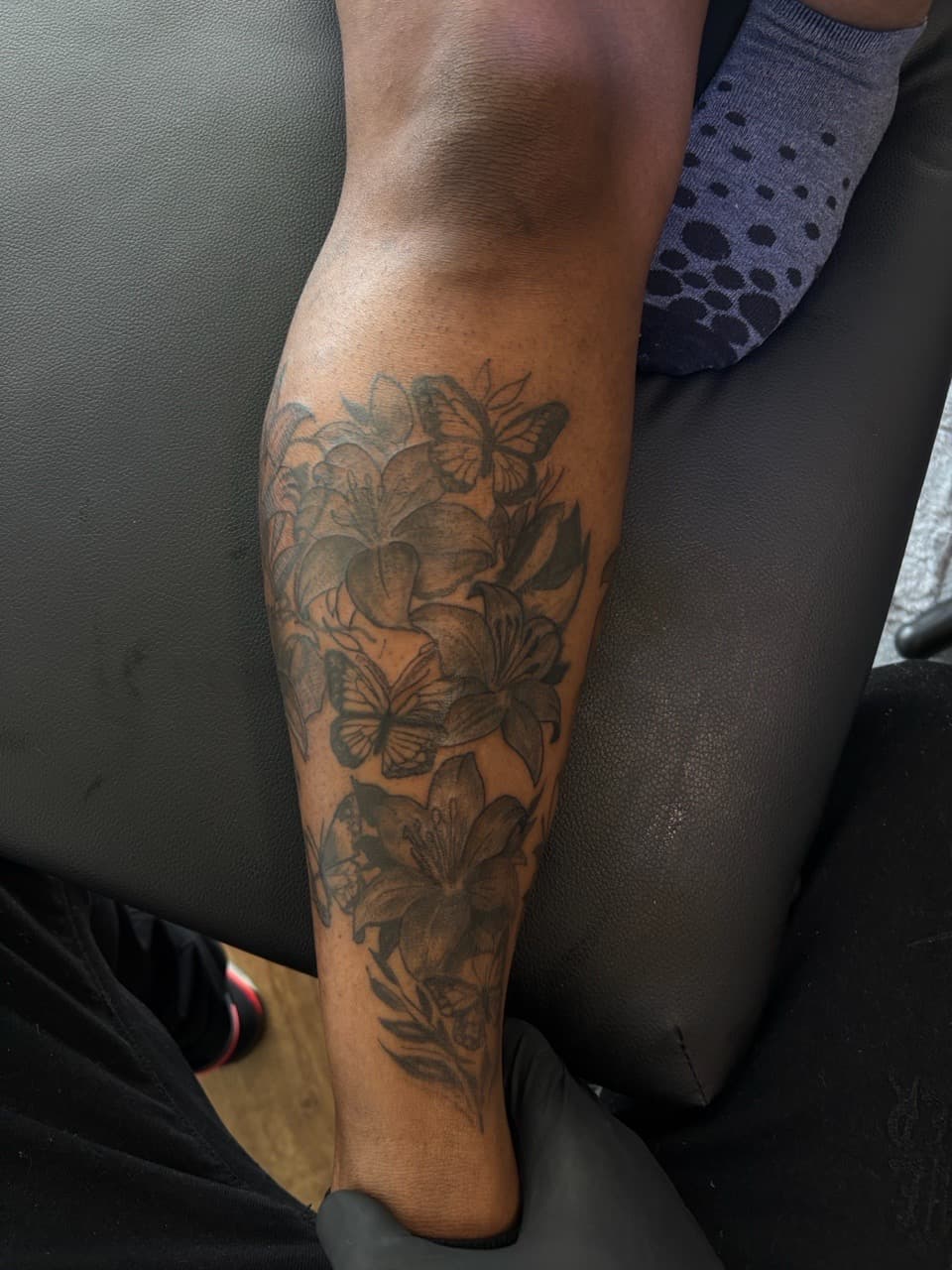 Black & Grey + Floral flowers tattoo on Calf by SnapInk on TattMe