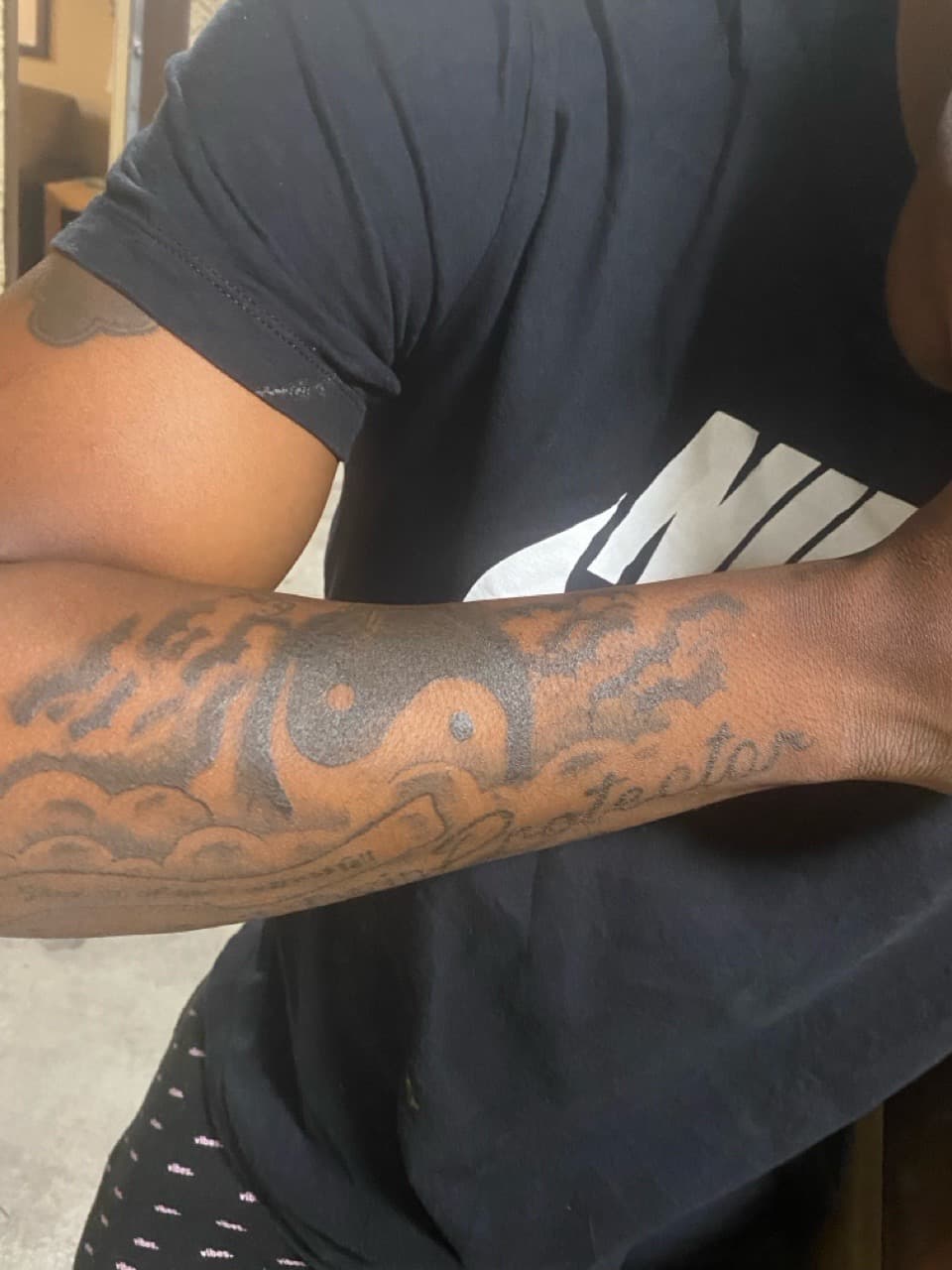Black & Grey + Lettering yin and yang tattoo on Forearm by SnapInk on TattMe
