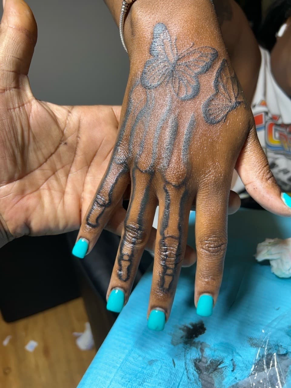 Black-work + Illustrative butterflies tattoo on Hand by SnapInk on TattMe