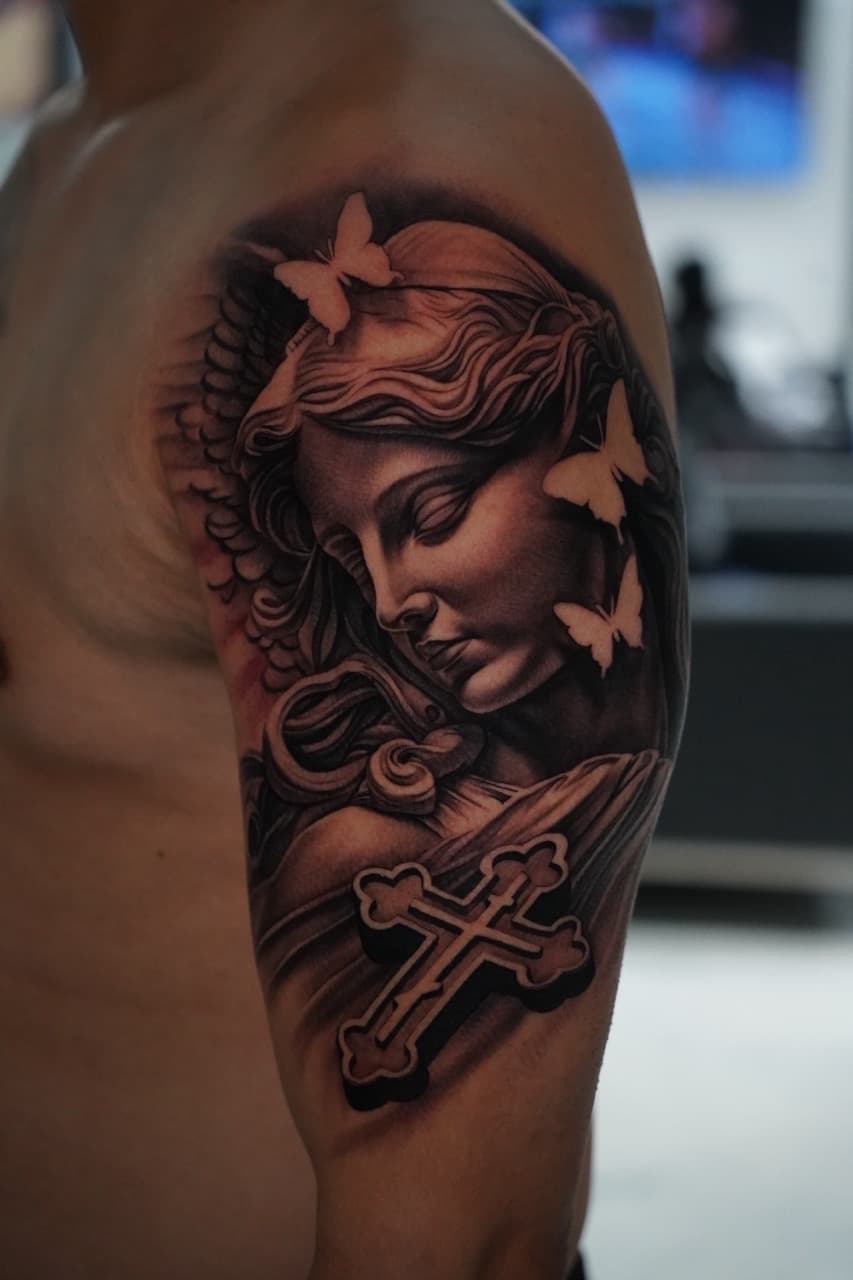 Black & Grey + Realism angel tattoo on Upper Arm by Devonne_Foxworth on TattMe