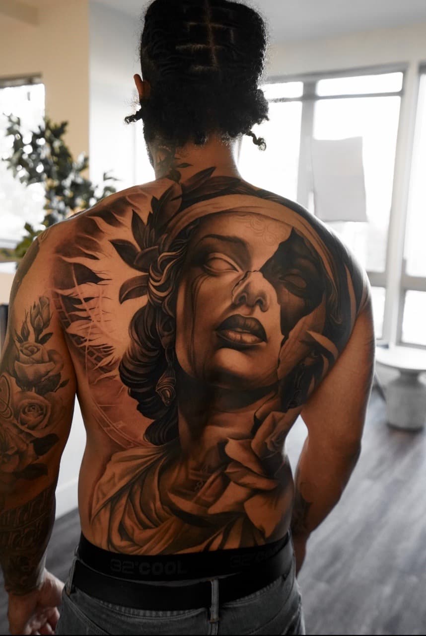 Black & Grey + Realism woman tattoo on Upper Back by Devonne_Foxworth on TattMe