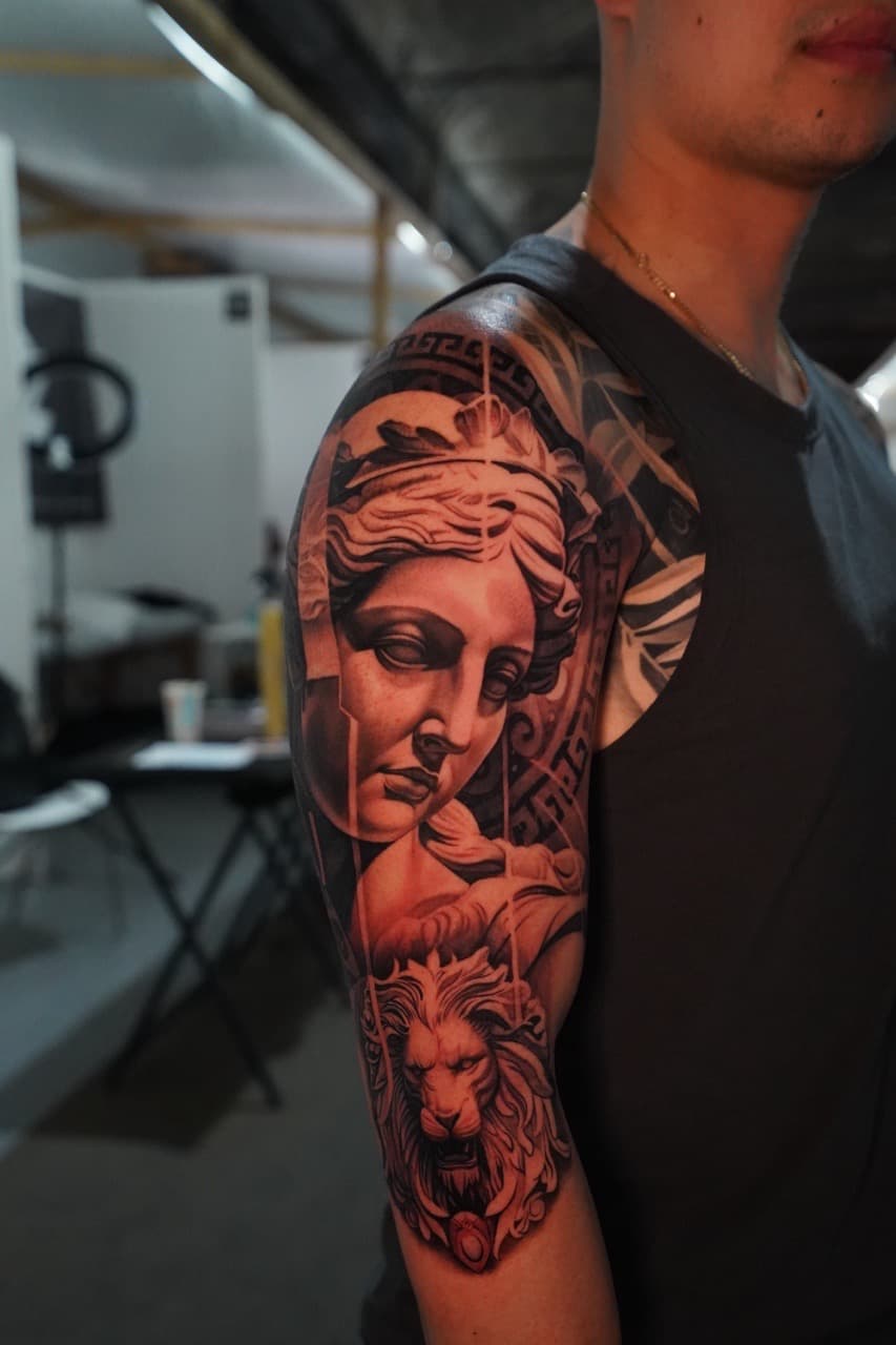 Black & Grey + Realism statue tattoo on Upper Arm by Devonne_Foxworth on TattMe