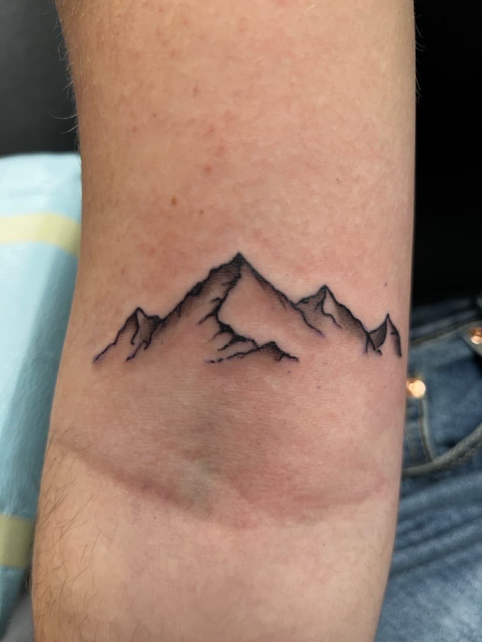 Fine Line + Minimalist mountains tattoo on Forearm by Kneedeep_tattoos on TattMe