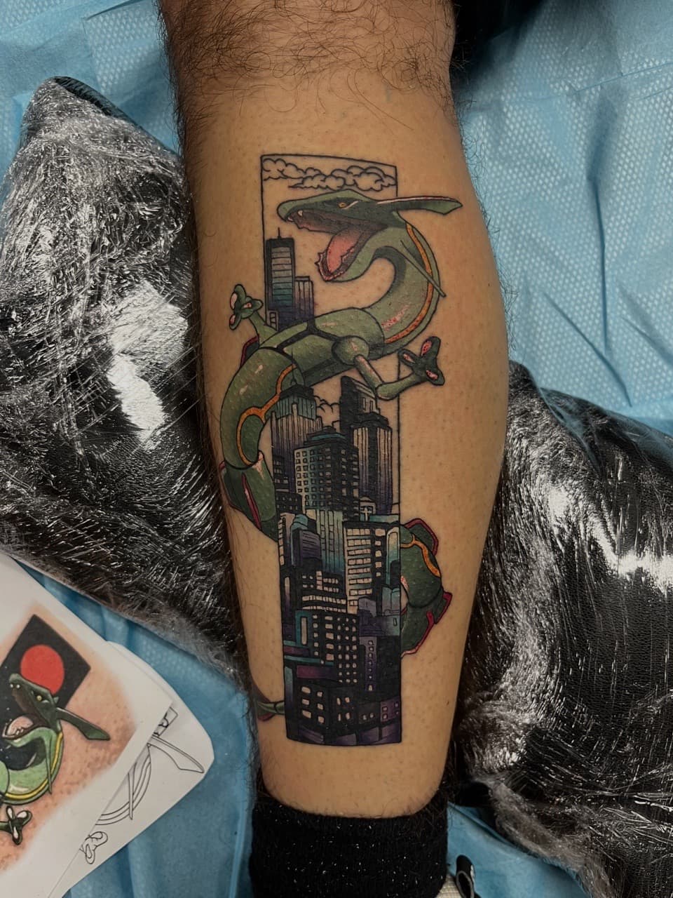Cartoon + Pop Culture rayquaza tattoo on Calf by Kneedeep_tattoos on TattMe