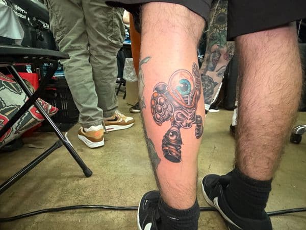 New School + Cartoon robot tattoo on Calf by Kneedeep_tattoos on TattMe