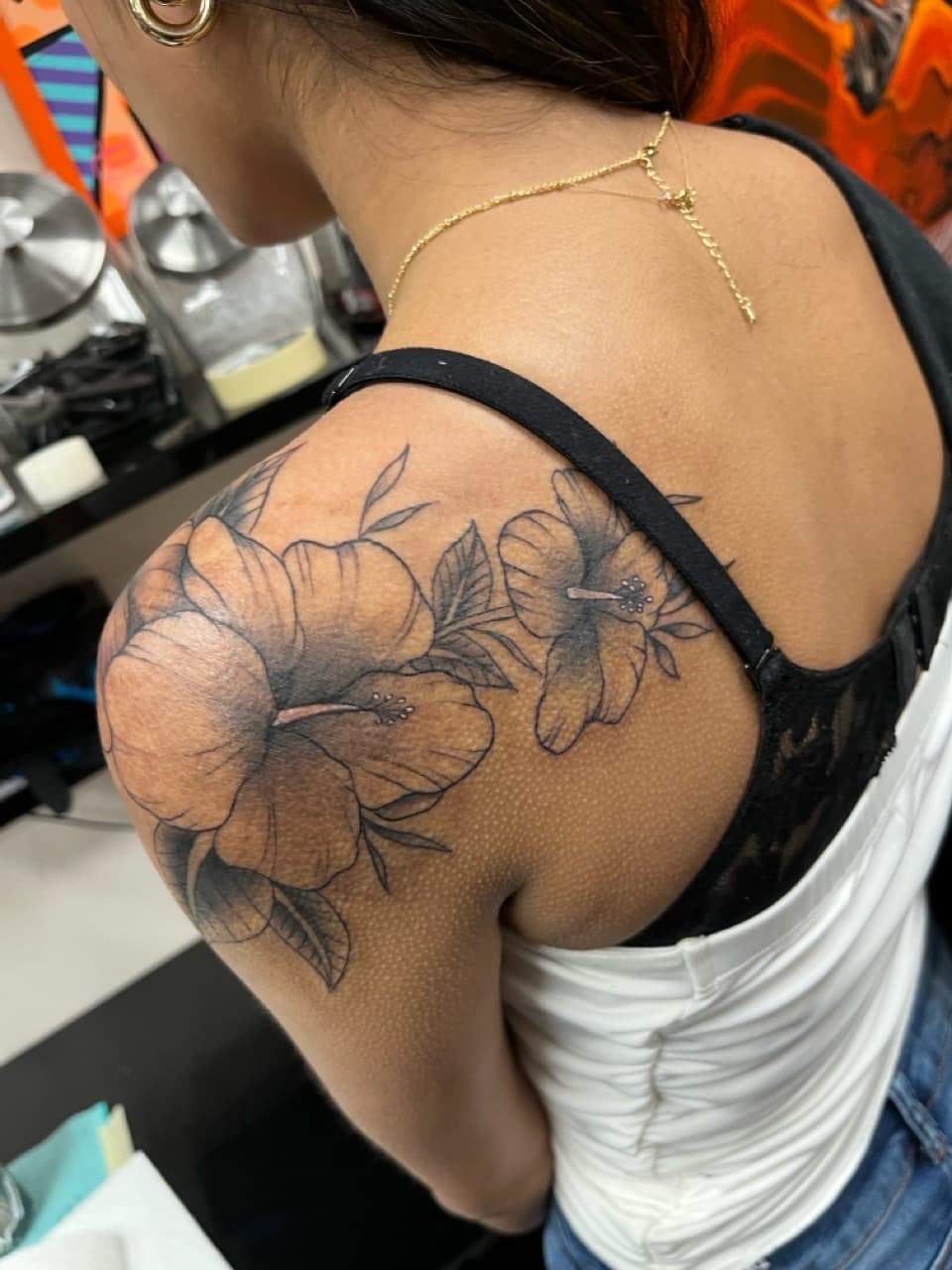 Floral + Black & Grey hibiscus tattoo on Shoulder by Kneedeep_tattoos on TattMe