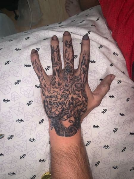 Black & Grey + Chicano woman tattoo on Hand by dna_arts on TattMe