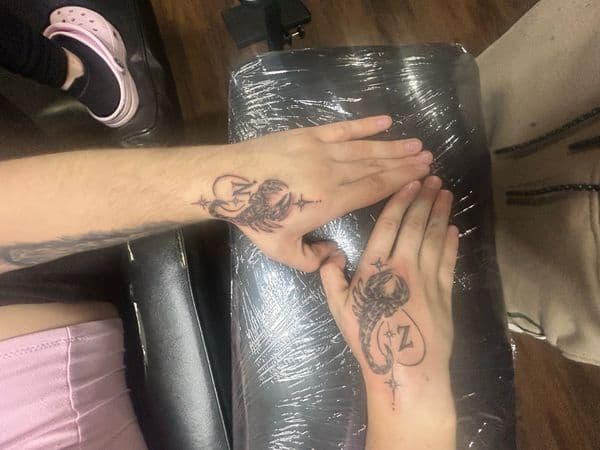 Fine Line + Black-work scorpion tattoo on Hand by dna_arts on TattMe