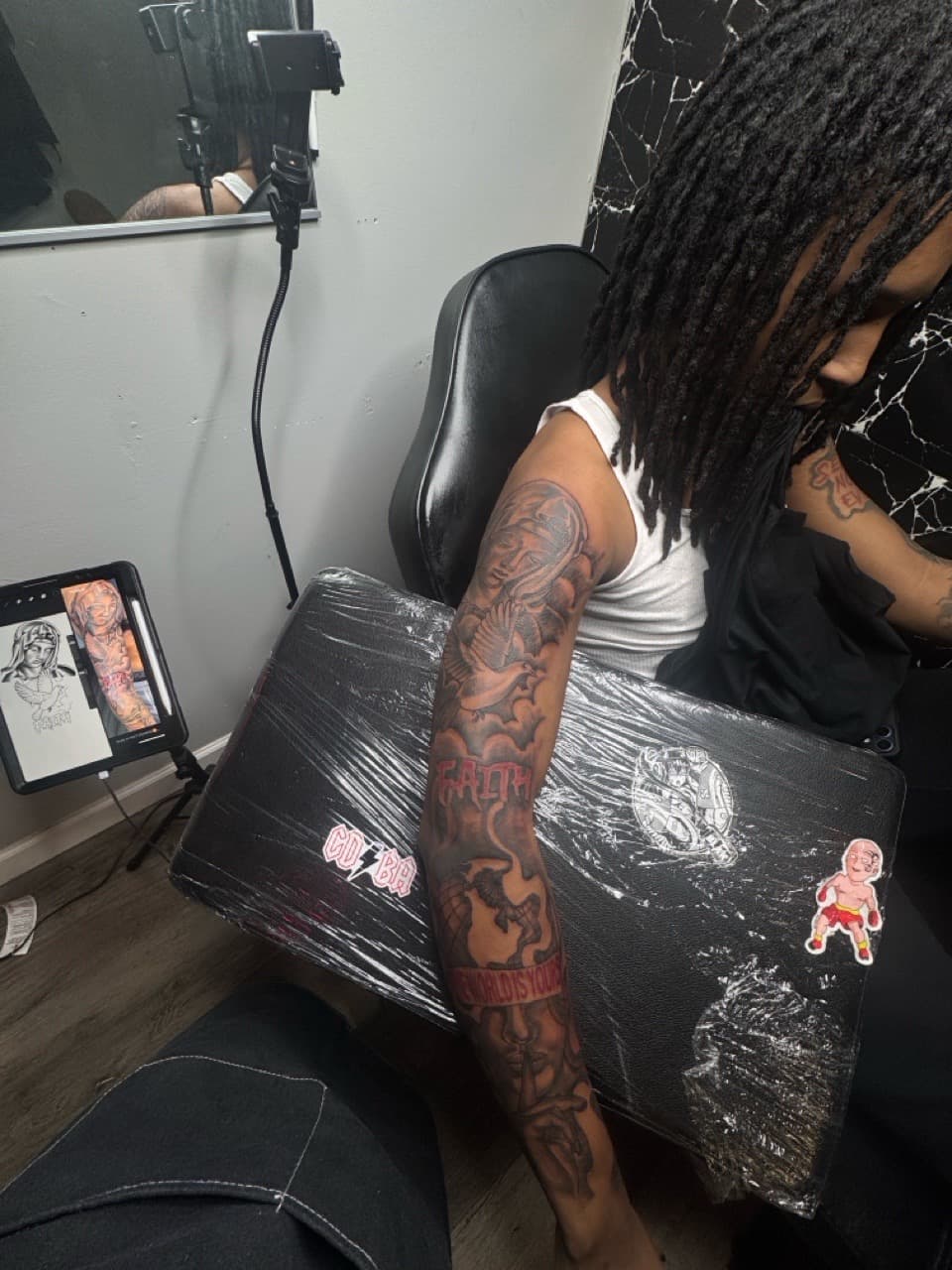 Black & Grey + Lettering religious figure tattoo on Full Sleeve by RZ_ink on TattMe