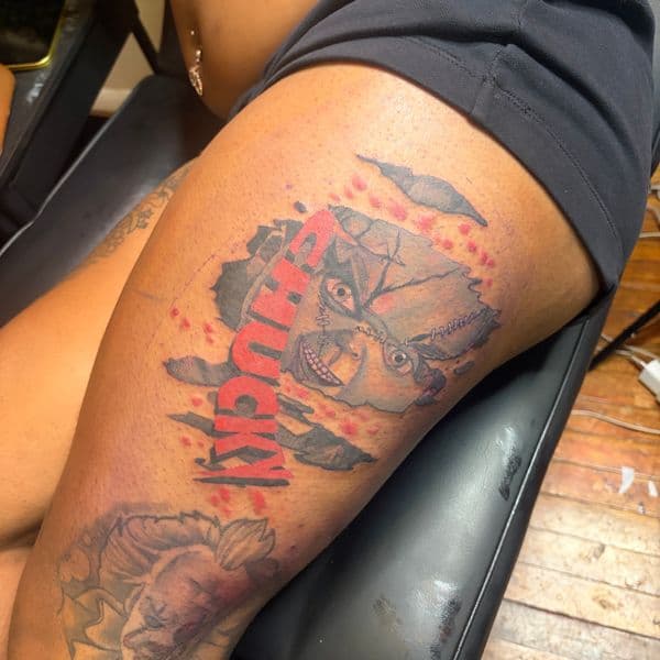 Illustrative + Color chucky tattoo on Thigh by RZ_ink on TattMe