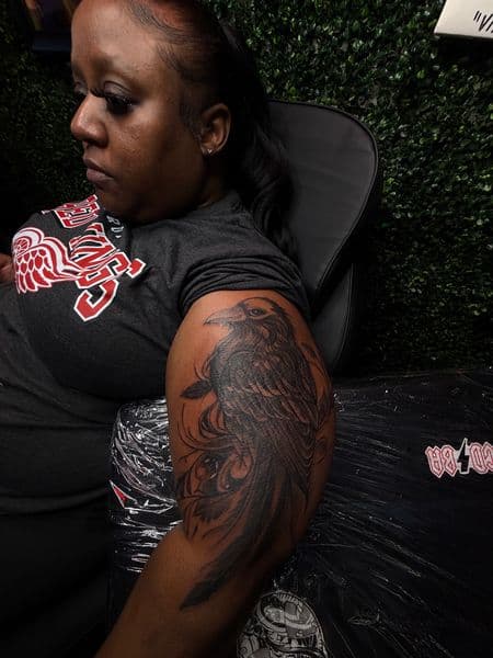 Black & Grey + Illustrative raven tattoo on Upper Arm by RZ_ink on TattMe