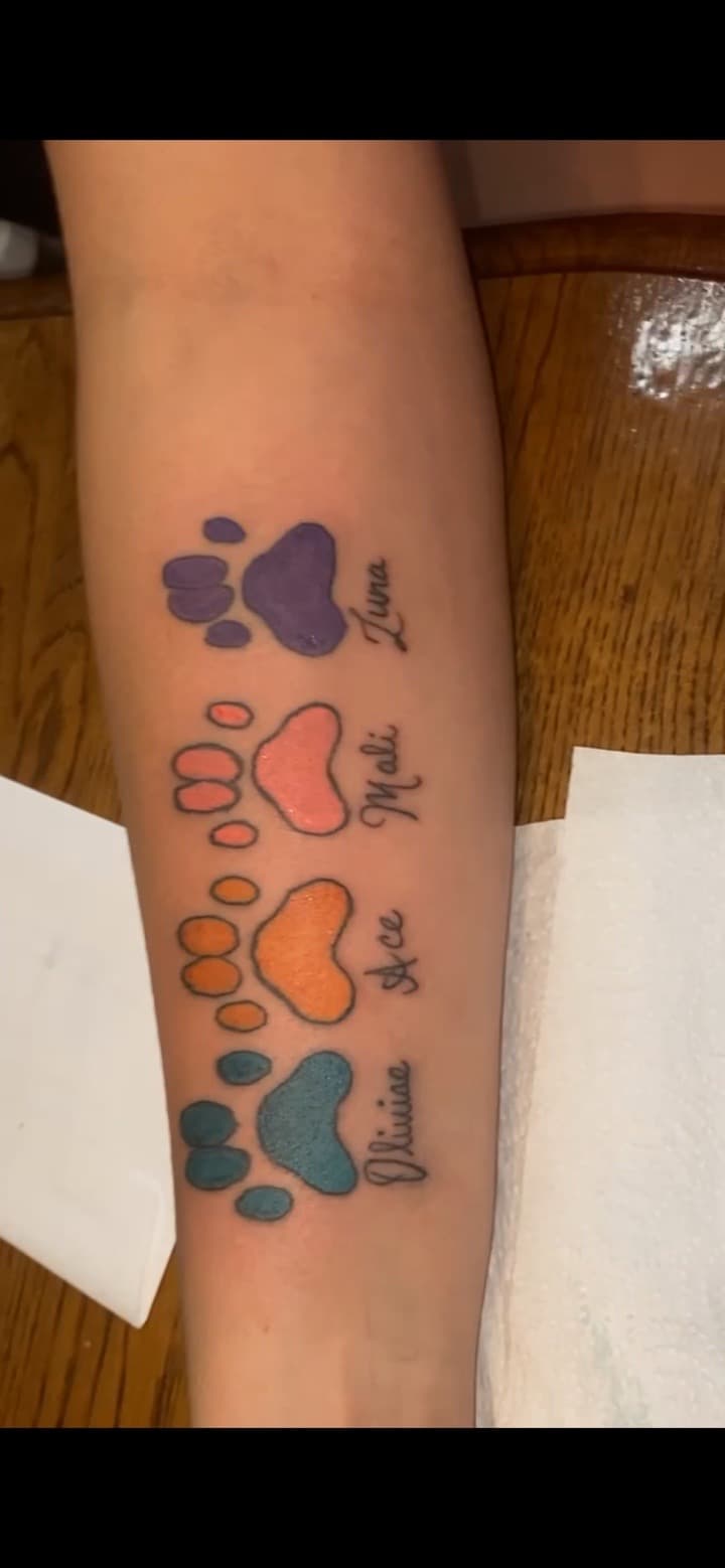 Color + Lettering paw prints tattoo on Forearm by Tats_By_Z on TattMe