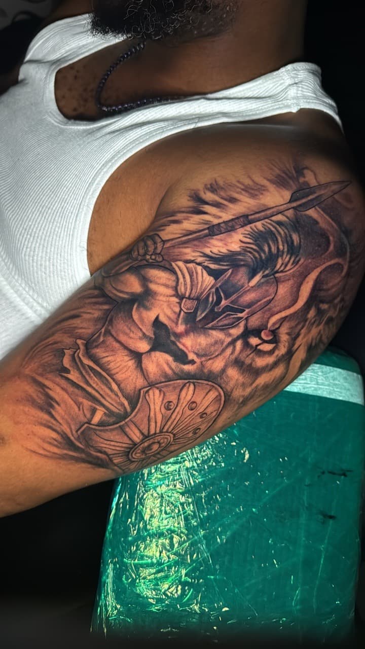 Black & Grey + Realism warrior tattoo on Upper Arm by Arink_Tattoo on TattMe