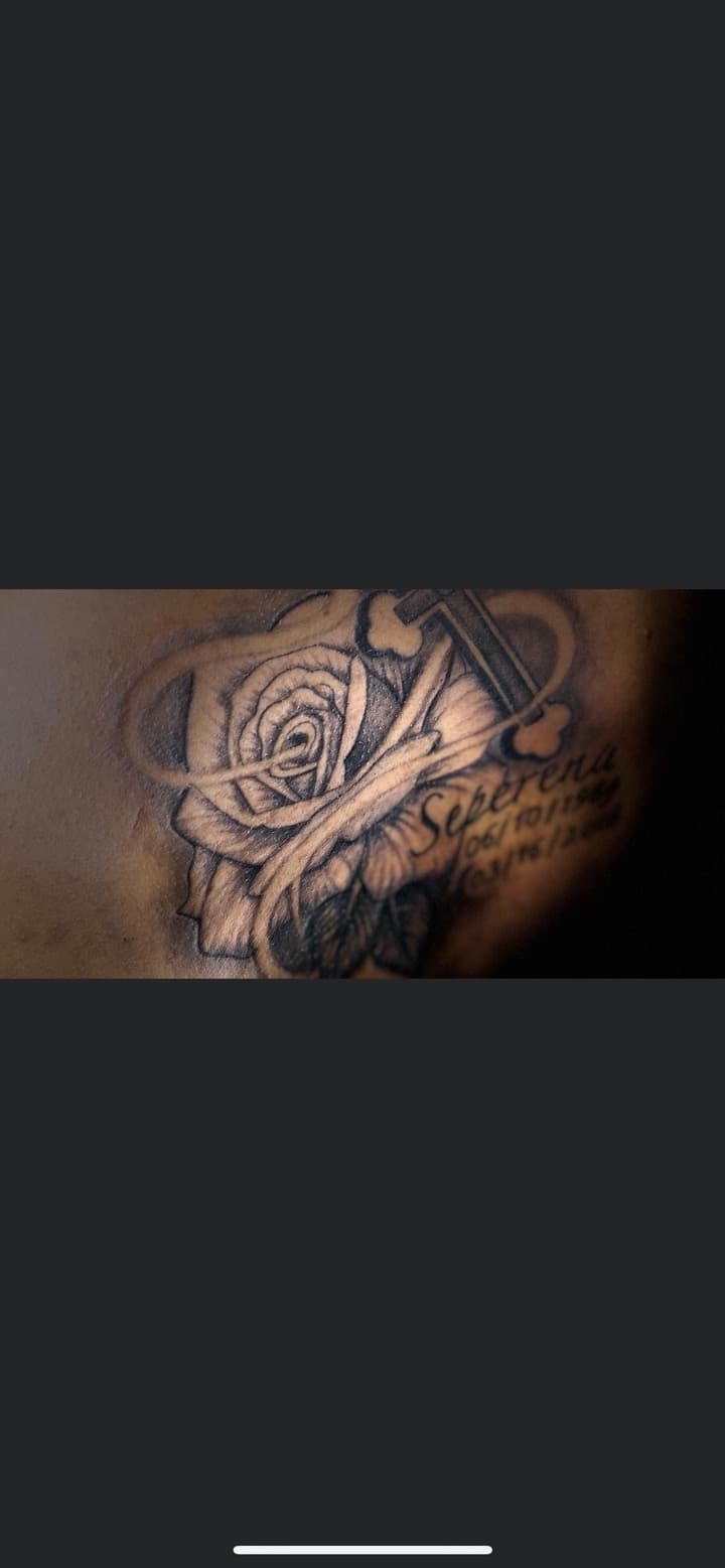 Black & Grey + Floral rose tattoo on Upper Arm by Arink_Tattoo on TattMe