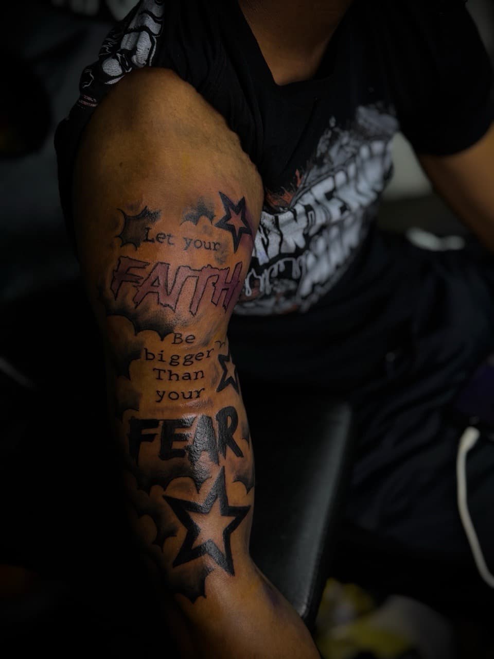 Lettering + Script stars tattoo on Upper Arm by HoodInkedd843 on TattMe