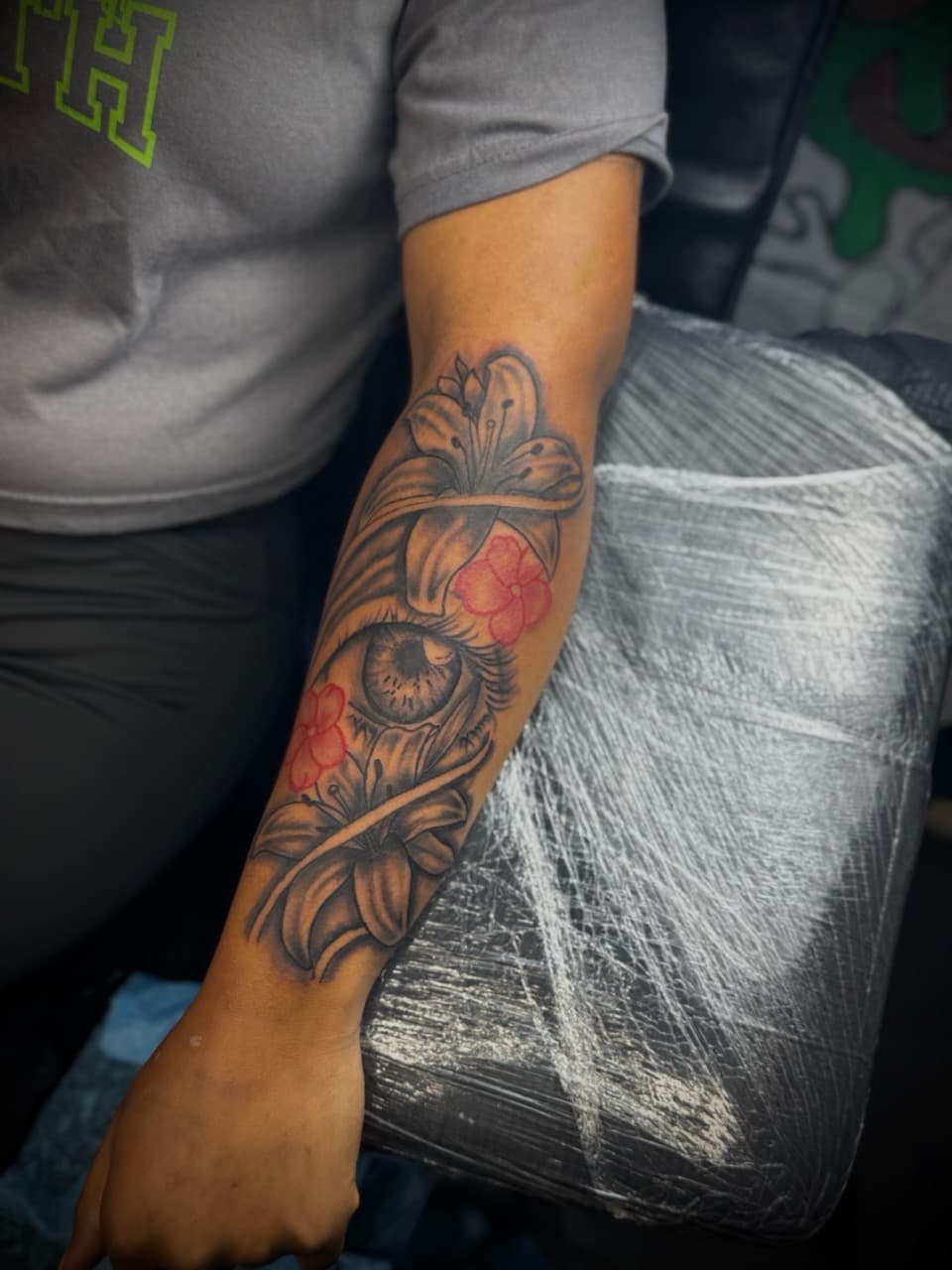 Black & Grey + Floral eye tattoo on Forearm by HoodInkedd843 on TattMe