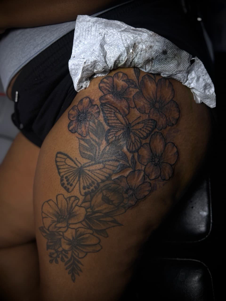Floral + Black & Grey flowers tattoo on Thigh by HoodInkedd843 on TattMe