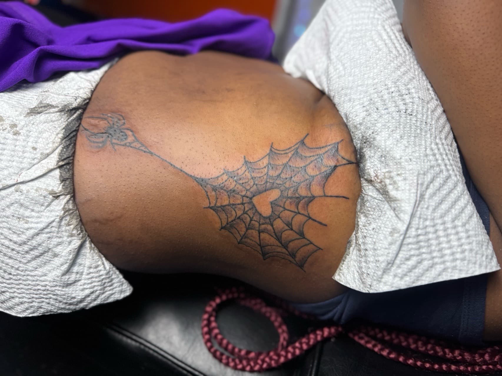 Fine Line + Black-work spider tattoo on Hip by HoodInkedd843 on TattMe