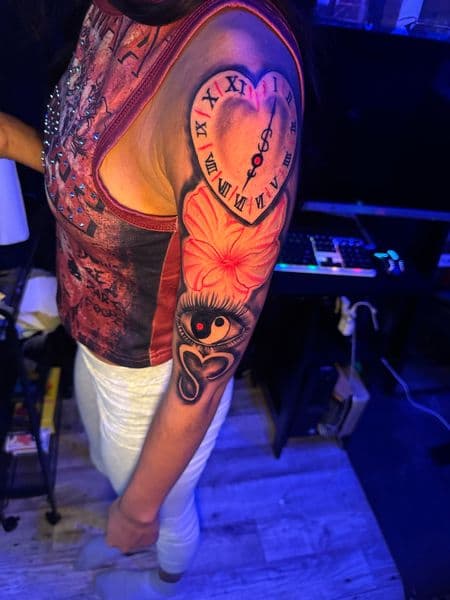 Color + Black-work heart tattoo on Half Sleeve by HoodInkedd843 on TattMe