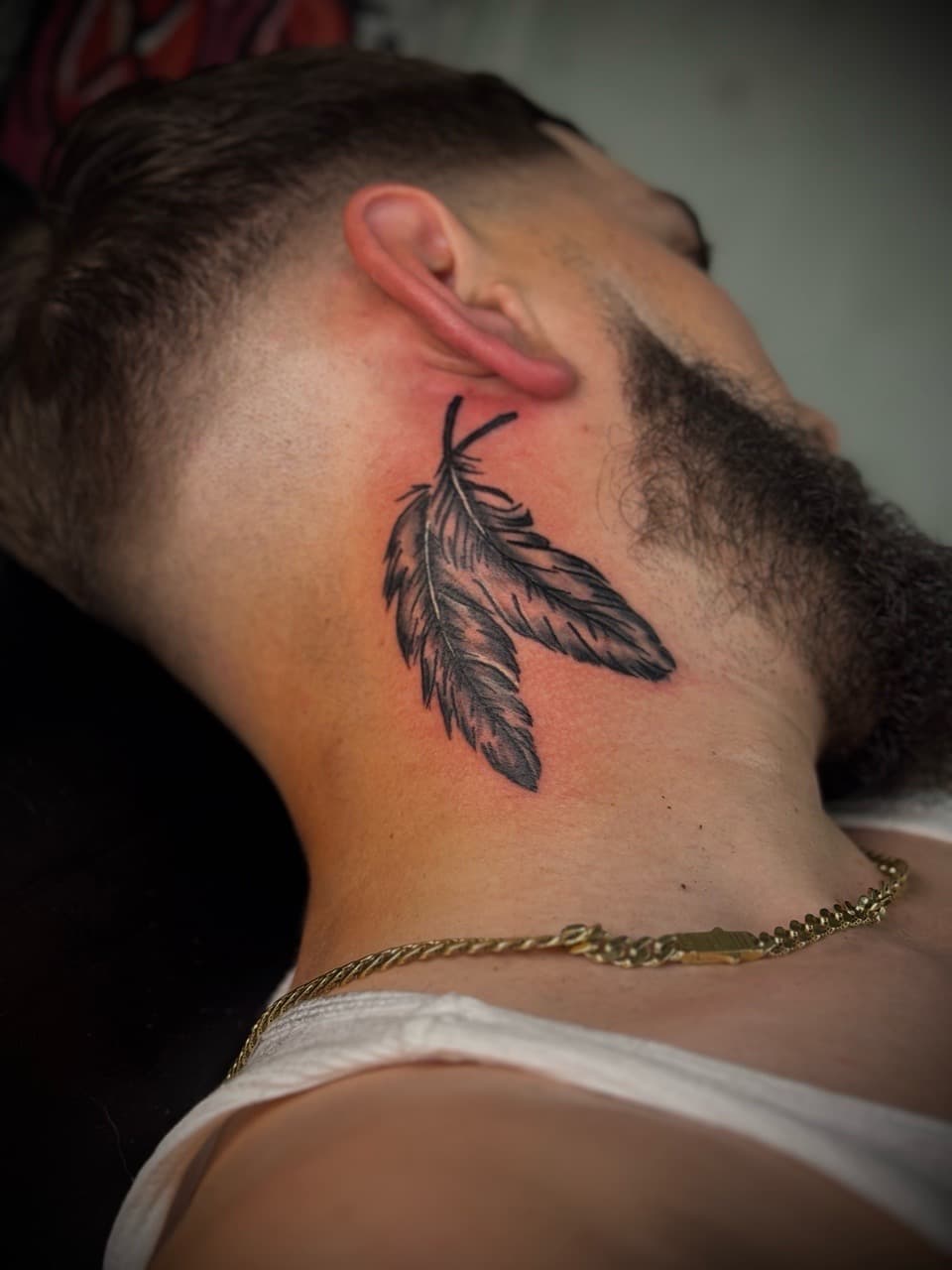 Black & Grey + Illustrative plumage tattoo on Neck (Side) by HoodInkedd843 on TattMe