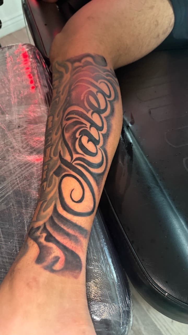Lettering + Script swirls tattoo on Calf by Tatted_By_Visions on TattMe