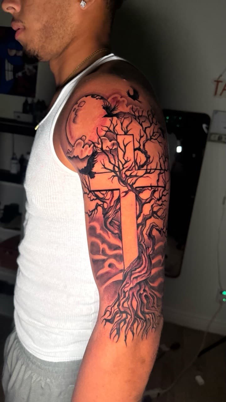 Black-work + Illustrative cross tattoo on Upper Arm by Tatted_By_Visions on TattMe