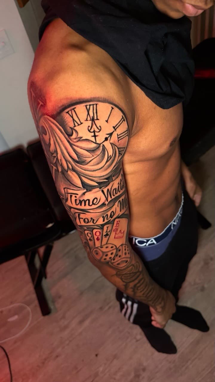 Black & Grey + Lettering clock tattoo on Half Sleeve by Tatted_By_Visions on TattMe
