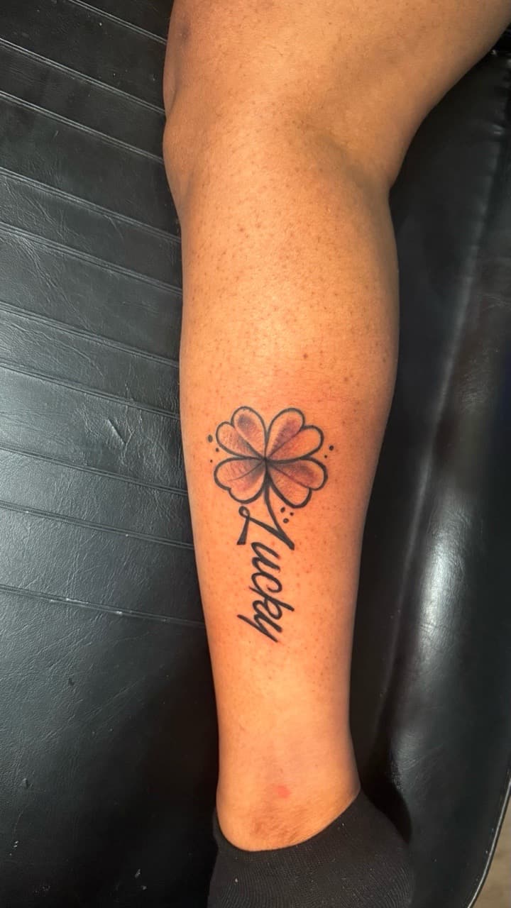 Black-work + Lettering clover tattoo on Calf by Tatted_By_Visions on TattMe