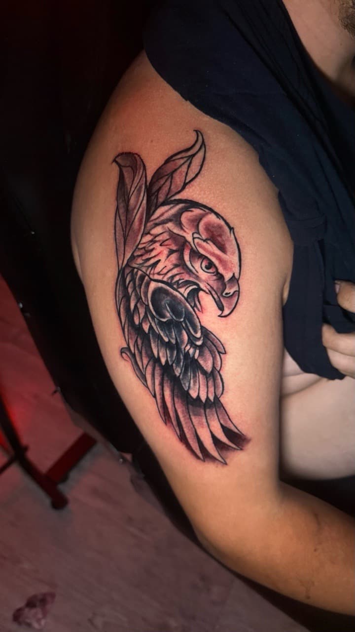 Black & Grey + Illustrative eagle tattoo on Upper Arm by Tatted_By_Visions on TattMe