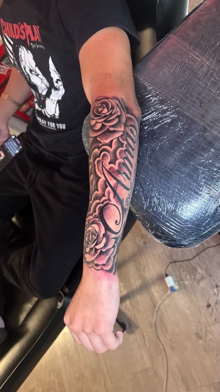 Black & Grey + Lettering roses tattoo on Forearm by Tatted_By_Visions on TattMe
