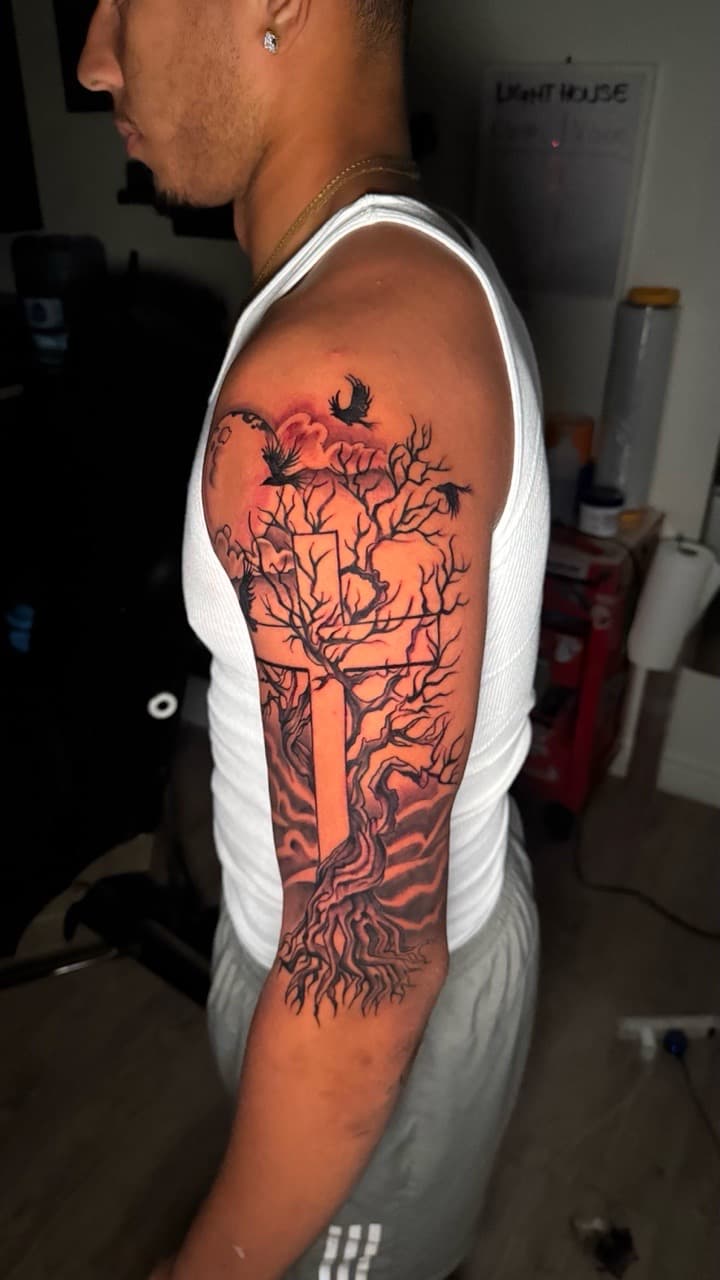 Black & Grey + Illustrative cross tattoo on Half Sleeve by Tatted_By_Visions on TattMe