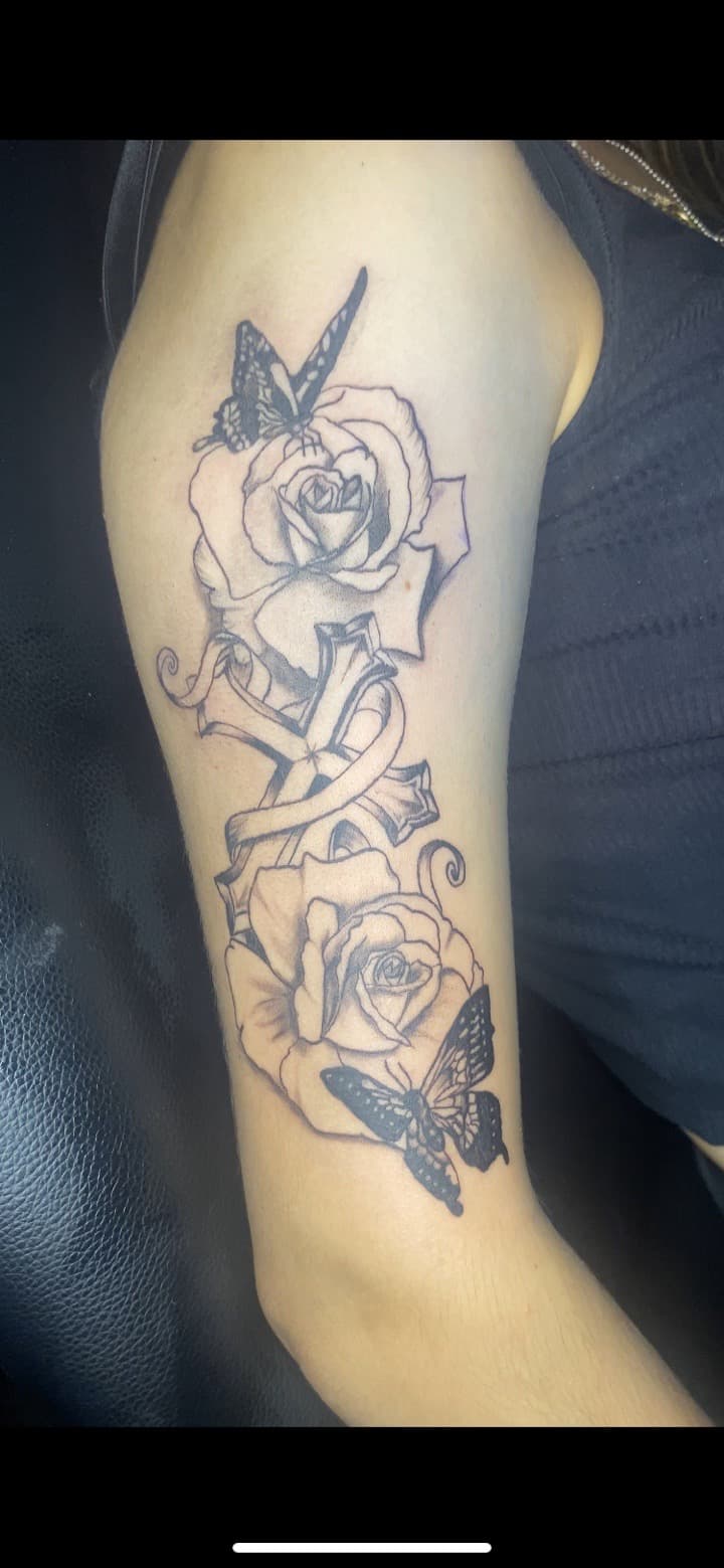 Black & Grey + Fine Line roses tattoo on Upper Arm by TATTFRM7 on TattMe