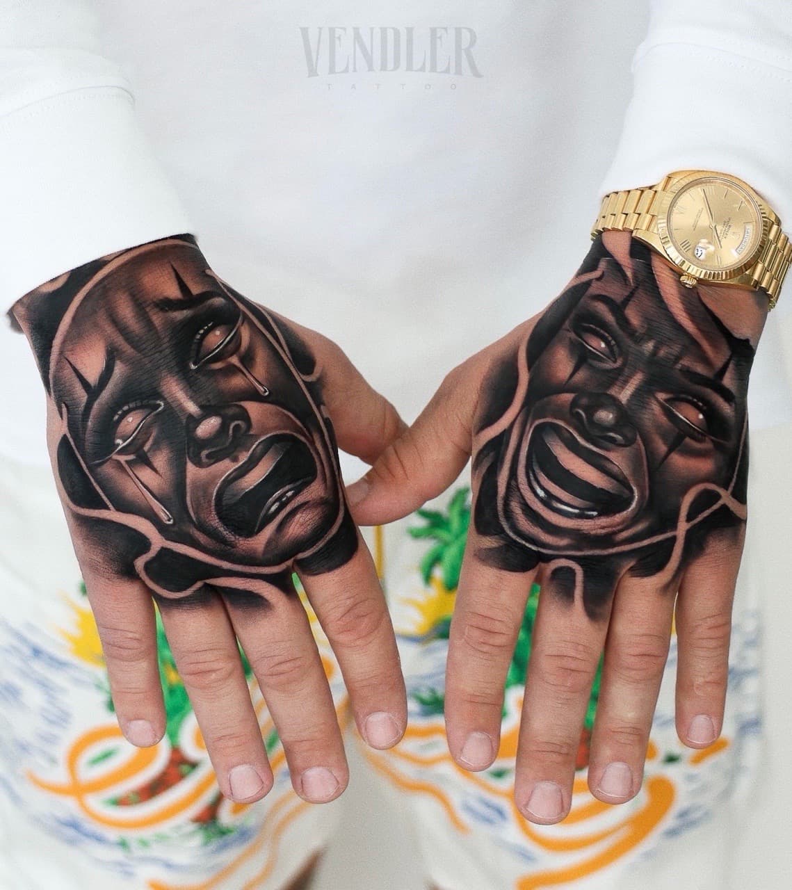 Black & Grey + Chicano clown mask tattoo on Hand by Vendler_Tattoo on TattMe