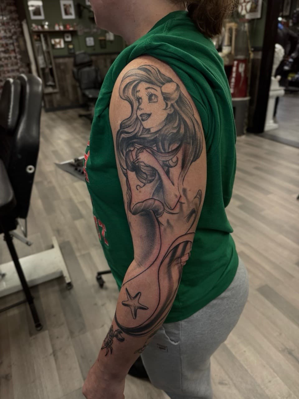Black & Grey + Cartoon ariel tattoo on Half Sleeve by Radtattoo on TattMe