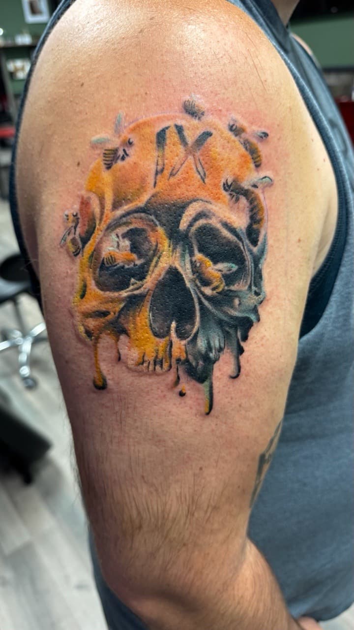 Illustrative + Color skull tattoo on Upper Arm by Radtattoo on TattMe